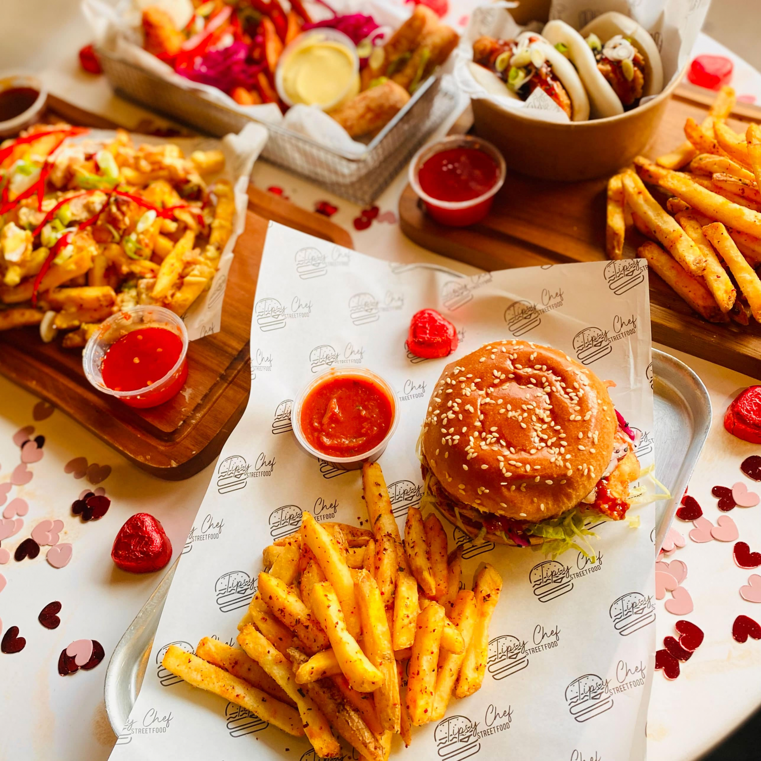 A Tipsy Chef street food spread: burgers, bao buns and loaded fries